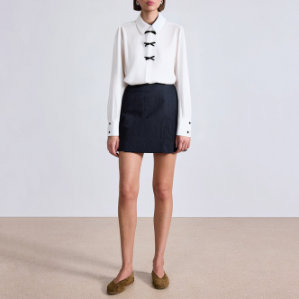Elegant bow-decorated women's business suit